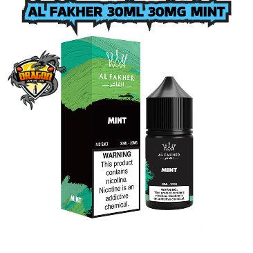 Al Fakher Mint e-liquid packaging with warning label on a white/ Al Fakher Mint Saltnic/ Al Fakher Mint Saltnic In Dubai/ Al Fakher Mint Saltnic in Abu Dhabi/ Al Fakher Mint Saltnic In Al Ain/ Al Fakher Mint Saltnic Sharjah/ Al Fakher Mint Saltnic Near me/ Al Fakher Mint Saltnic Downtown/ Al Fakher Mint Saltnic Business Bay/ Al Fakher Mint Saltnic Palm Jumeirah/ Al Fakher Mint Saltnic Al Barsah/ Al Fakher Mint Saltnic Damac Hills/ Al Fakher Mint Saltnic Arjan/ Al Fakher Mint Saltnic Media City Dubai