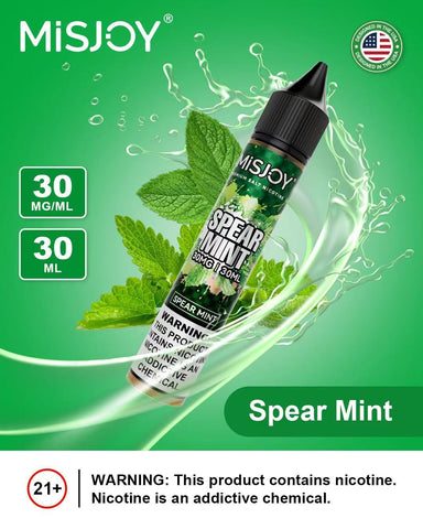 Misjoy Spear Mint vape juice bottle with green leaves on a green background